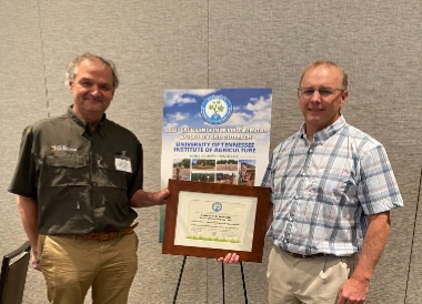 UTIA Professors Forbes Walker and Shawn Hawkins accepting the Governor's Award for Environmental Stewardship.