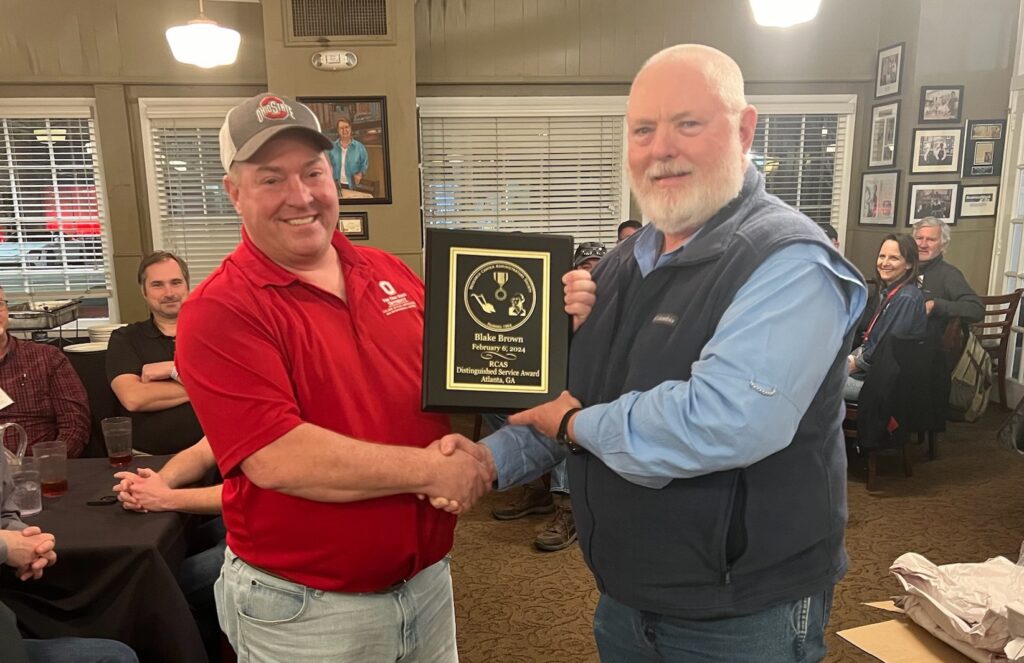 Blake Brown receiving Distinguished Service Award