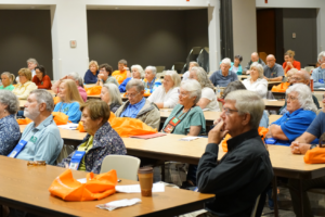 Participants indoors at a Fall in the Gardens meeting