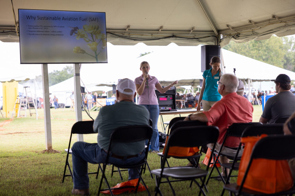 A speaker presenting about Sustainable Aviation Fuel