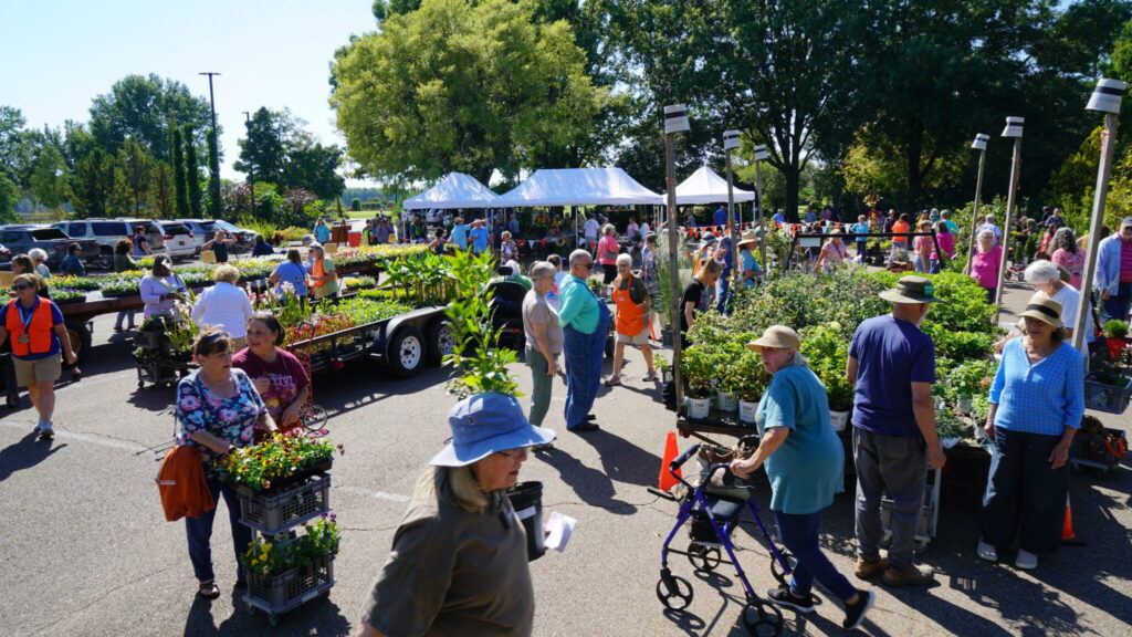 A crowd of people attending the Plant sale